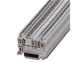 Tættere på Phoenix Contact ST 1,5 gennemgangsklemme, viser den grå farve og fjedertilslutningens indre mekanik.