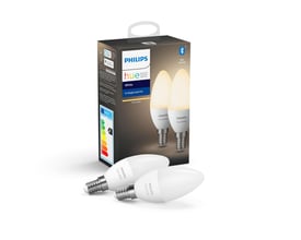 Philips Hue White E14 LED-kertepære med Zigbee ved siden af æsken, hvor pærerne og emballagen vises.