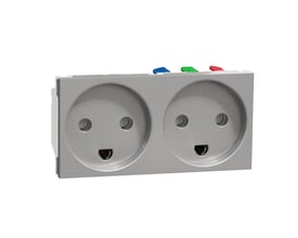 Schneider Electric Unica dobbelt stikkontakt i metallic finish, med synlige terminaler og farvekodede knapper på toppen.