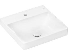 Hansgrohe Xelu Q håndvask i porcelæn, set skråt forfra, med hanehul og afløb i midten.