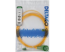 Gult OS2-fiberkabel, 4 meter, oprullet i transparent emballage med LC- og SC-duplexstik.