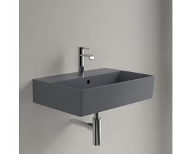 Villeroy & Boch Memento 2.0 håndvask i grå, vægmonteret på betonvæg med forkromede rørføringer.