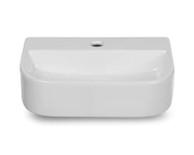 Mat hvid firkantet håndvask i keramik med mål 32x22x8,5 cm og centreret hanehul.