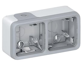 Legrand Plexo underlag i grå og hvid, vist i et let vinklet perspektiv, der fremhæver dets robuste konstruktion.