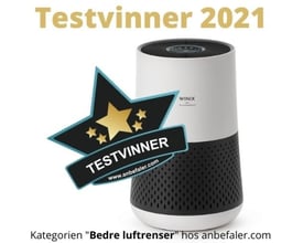 Winix Zero Compact luftrenser med "Testvinder 2021" stempel foran en hvid baggrund.