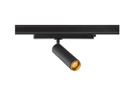 SLV GRIP! M 3F spot i sort med gylden detaljering monteret på en sort skinne, der lyser varmt.