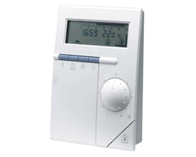 Siemens QAW70-A digitalt rumapparat med tydeligt display, drejeknap og multifunktionsknapper på en hvid front.