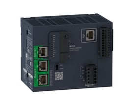 Schneider Electric M262 logisk controller TM262L10MESE8T med to Ethernet-porte, serielport og terminalblokke på en hvid baggrund.