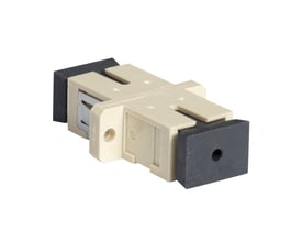 Lauritz Knudsen fiberadapter SC MM simplex i beige plast med sorte endestykker til sammenkobling af fiberkabler.