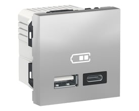 Schneider Electric New Unica USB-oplader NU301830 i aluminium med en standard USB-A port og en USB-C port. Opladeren har et batteri-ikon øverst og en hvid bagside.