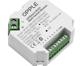 OPPLE Smart Lighting-modul LEDSMART-BLE2-Multi-Switch-Module set skråt ovenfra med grønne skrueklemmer.