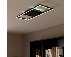 Sort EGLO Calagrano-Z loftlampe med hvidt lys monteret i et hyggeligt rum med bogreol.