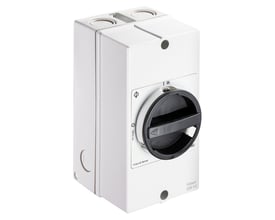 Kraus & Naimer EMC reparationsafbryder på 25 A med hvid plastkapsling og sort drejehåndtag, set skråt forfra.