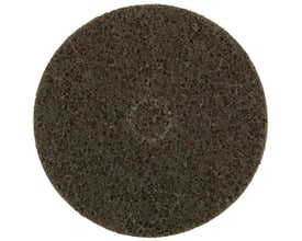 Tyrolit PREMIUM SCM-vliesrondel, 115 x 22 mm, medium P, set forfra med mørk, grov overflade.