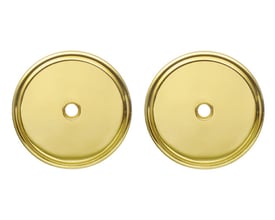 To runde Beslagsboden Spar-blindskilte i poleret messing PVD med et lille hul i midten, set forfra.