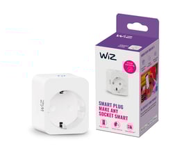 WiZ Smart Plug emballage med produktet placeret ved siden af, begge i hvid plast med produktinformation på dansk.