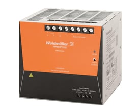 Nærbillede af Weidmüller Pro Max strømforsyningens frontpanel, der viser 24VDC output terminaler og justeringsknap.
