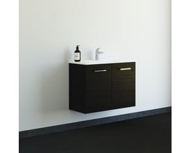 Vinklet billede af Dansani Mido mini møbelpakke i sort med to låger, Amber Mini håndvask, monteret på en hvid væg over et mørkt gulv.
