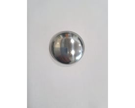 Ronda/Ghibli Starlock D.18 med kappe, et enkelt, skinnende sølvfarvet komponent med en afrundet form på en hvid baggrund.