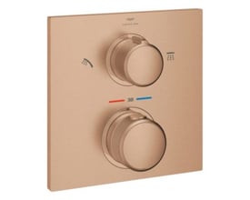 Grohe Allure New Rapido T indbygningstermostat i børstet Warm Sunset med to runde betjeningsgreb på en kobberfarvet plade.