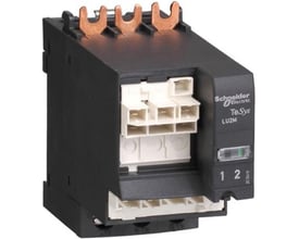 Schneider Electric TeSys LU2M reverser modul, 24VDC, med kobberterminaler og hvide stik på sort hus.
