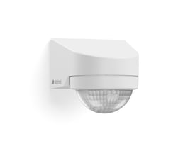 Steinel MD IR N130 bevægelsessensor i hvid plast med et klart sfærisk sensorhus monteret på en hvid væg.