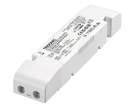 Tridonic LED driver LC 18W 24V med DALI-2 styring og one4all funktion, udført i hvidt plast med tydelig mærkning og tilslutningsterminaler.