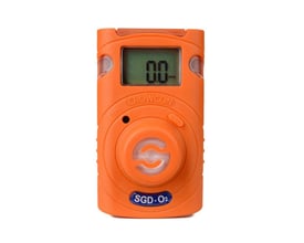Front view af Crowcon Clip SGD O2 gasdetektor i orange. Displayet viser 0.0 PPM og et symbol for ilt, står isoleret på hvid baggrund.