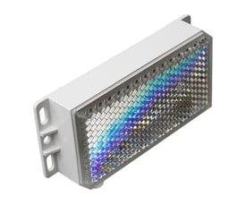 Carlo Gavazzi prismereflektor med varme, 24 VDC og 8 W, set skråt forfra med facetteret refleksflade og monteringsbeslag.