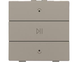 Niko audio tryk i en lys beige farve med tre knapper, øverste og nederste har pile-ikoner, midterste har play/pause symbol.
