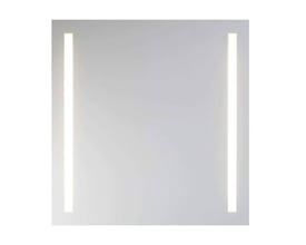 Tæt på Laufen Arte spejl, der viser de to oplyste lodrette lysfelter på en ren, hvid overflade.