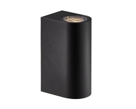 Detaljeret billede af Nordlux Asbol væglampen i sort aluminium med et klart glas, der viser det integrerede lys.