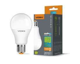 Videx A60 LED-pære med E27-fatning og neutralhvidt lys vises ved siden af den grå og orange produktemballage.