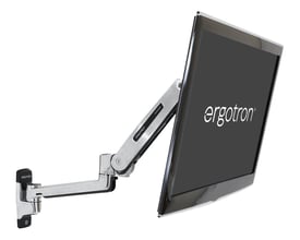 ERGOTRON LX monteringssæt til LCD display monteret på væg med en stor skærm, viser armens bevægelighed og poleret aluminium finish.