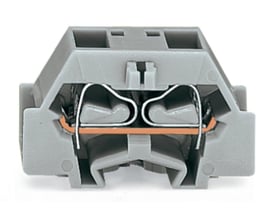 Detaljeret billede af Wago gennemgangsklemme mini, der viser dens interne CAGE CLAMP-mekanisme og grå plastydre.