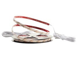 SG Armaturen StripLine 10m LED strip med 15W/m og 2700K, vist opviklet på en spole med tilslutningskabler.