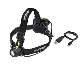 Ironside genopladelig hybridpandelampe med sort pandebånd, lampehoved, batteripakke og USB-opladerkabel.