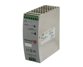 Carlo Gavazzi strømforsyning på 10 A med 24 VDC-udgang og grønne skrueklemmer, set skråt forfra.