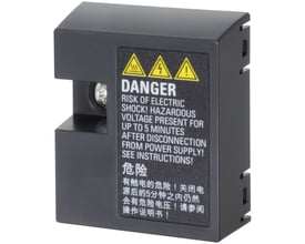 Siemens SINAMICS V20 BOP interface i sort plast med advarselsmærkater og elektriske advarselssymboler.