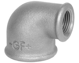 Georg Fischer galvaniseret 90° vinkel af blødstøbt støbejern med indvendigt gevind i begge ender, dimension 2" x 1¼".