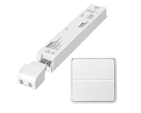 Jumitech 150W 24V LED driver og et trådløst Fuga tryk er vist sammen på hvid baggrund.