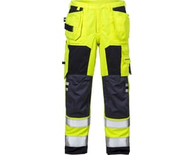 Fristads Flamestat 2075 håndværkerbukser i hi-vis gul og marineblå med praktiske lommer og refleksbånd.