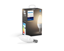 Philips Hue White E14 LED-kertepære ses sammen med sin emballage, der viser pæren med varmt hvidt lys.