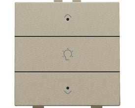 Niko dæmpertryk til enkelt lyskreds i champagnefarve med LED-indikator og op/ned pile samt lyspære-symbol.