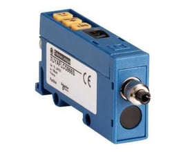Schneider Electric lys aftastningsforstærker til fiberoptik, model XUYAFLC0966S, blå med gule knapper og separat output signal.