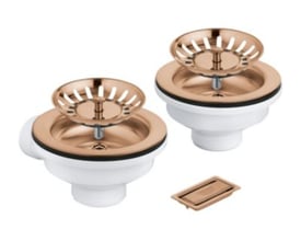 Grohe bundventil i børstet warm sunset kobber med hvid bund og rist. To stk. ses på billedet, samt et overløbsdæksel.