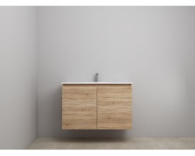 Sanibell Online møbelsæt i bardolino eg, 101x46 cm, med to grebsfrie låger og en integreret porcelænsvask med armatur.