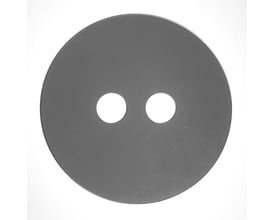 Purus microcement installationsbeskyttelse, et rundt gråt slibelåg med to cirkulære huller for tæt installation.