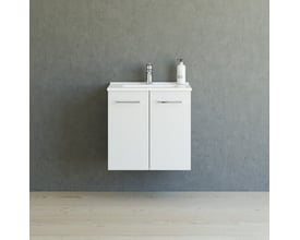 Dansani Mido mini møbelpakke i hvid højglans med to låger og Amber Mini porcelænsvask monteret på væg foran grå betonvæg.