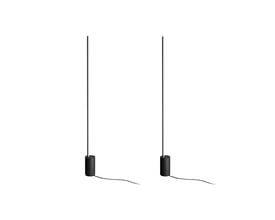 To sorte Philips Hue Signe gulvlamper med ledning og den runde base, vist isoleret på hvid baggrund.